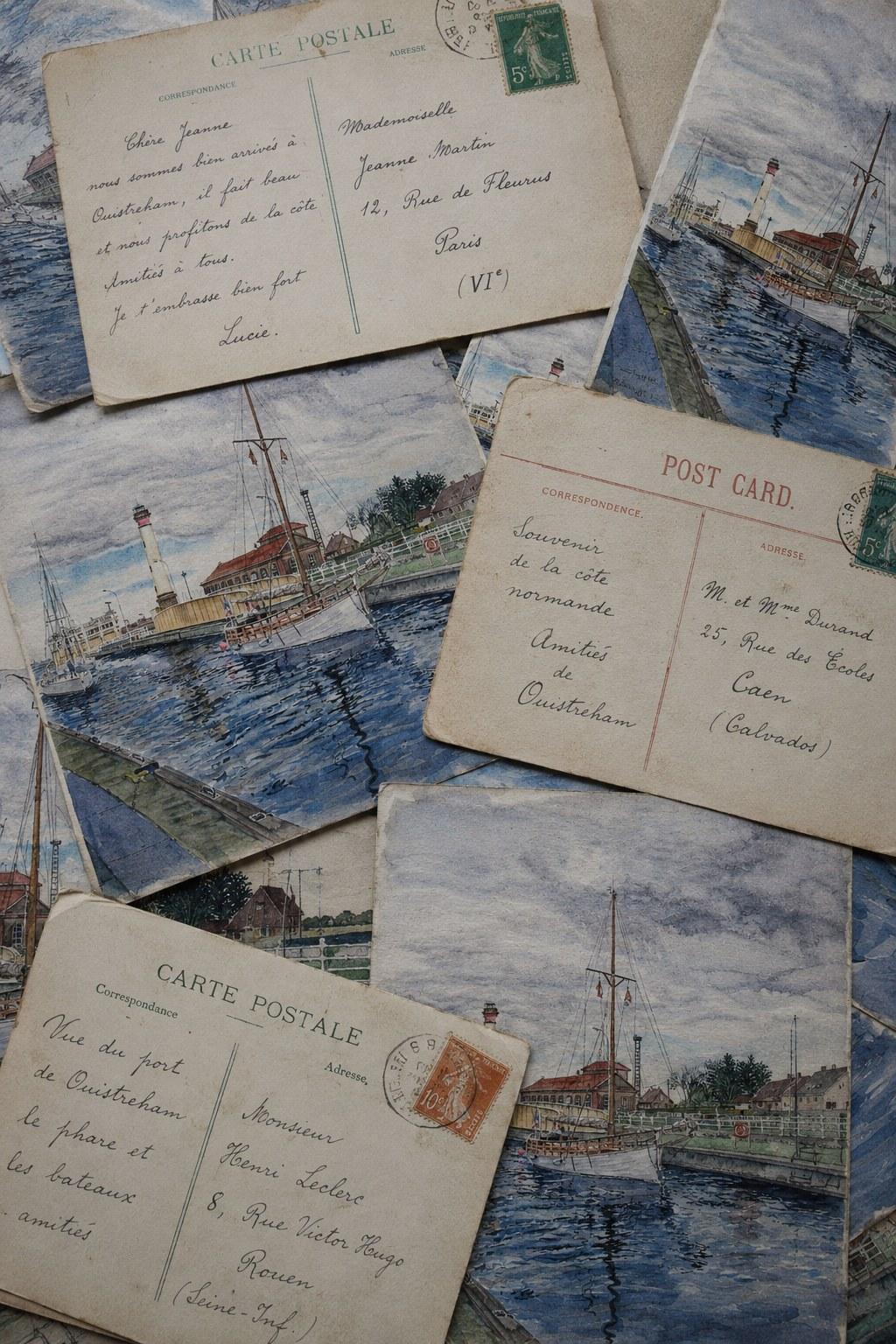 Cartes postales anciennes de Ouistreham : le phare, le port et des correspondances manuscrites du début du XXe siècle